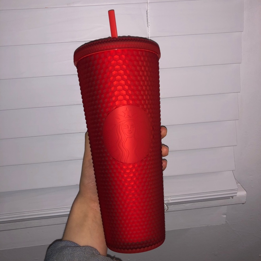 Red studded Starbucks cup